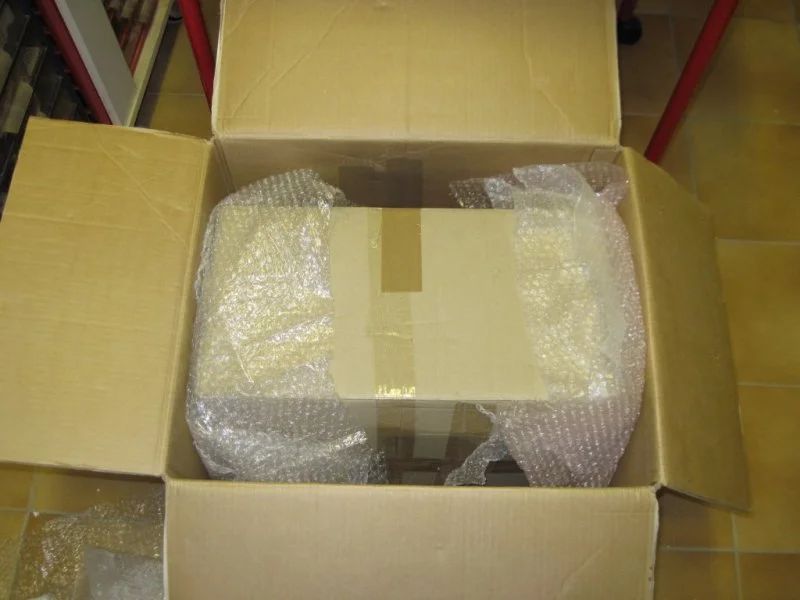 Diagram showing an inner box padded inside a larger outer box